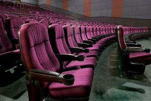 Theater seating arranged in a comfortable auditorium for live events