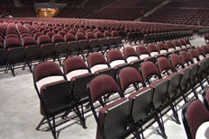 chairs stacked across arena